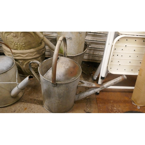 5156 - A quantity of galvanised steel items including a bucket, three watering cans, a mop bucket, chicken ... 