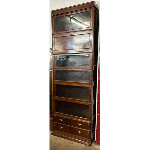 139 - An early 20th Century mahogany seven tier sectional stacking bookcase