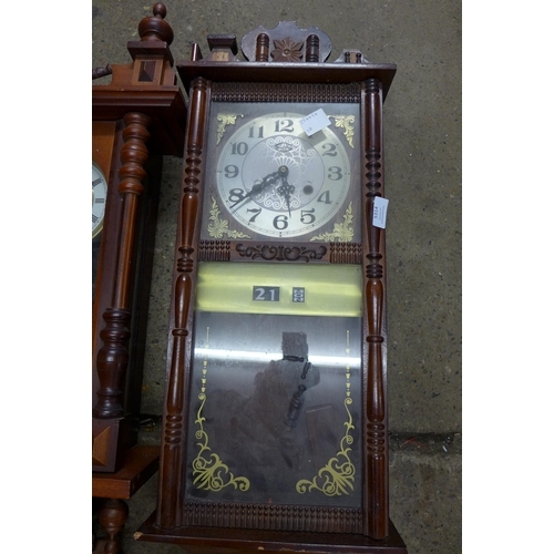 5314 - Two timber cased pendulum wall clocks