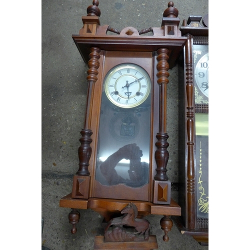 5314 - Two timber cased pendulum wall clocks