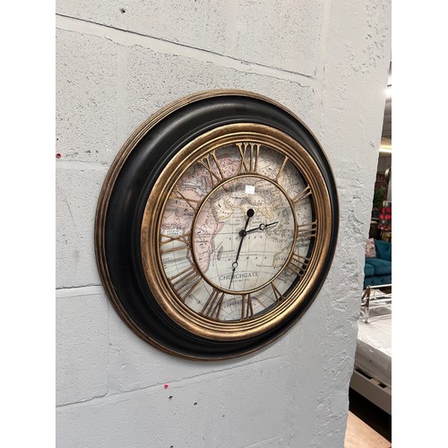 3079A - A terrestrial faced wall clock