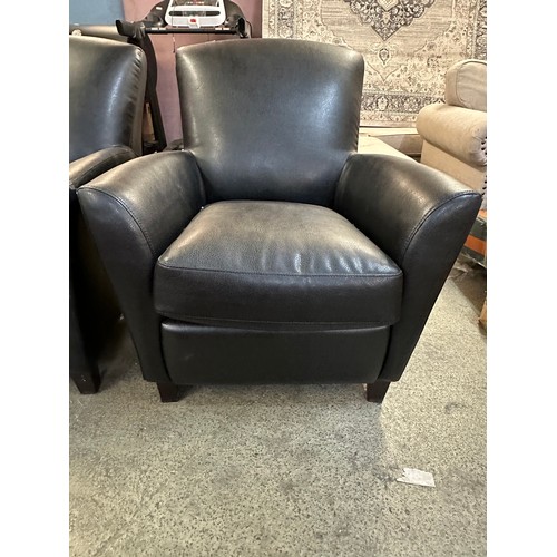 3184 - A pair of black Carezza Phoenix leather effect armchairs