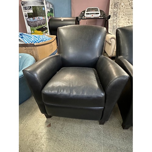 3184 - A pair of black Carezza Phoenix leather effect armchairs