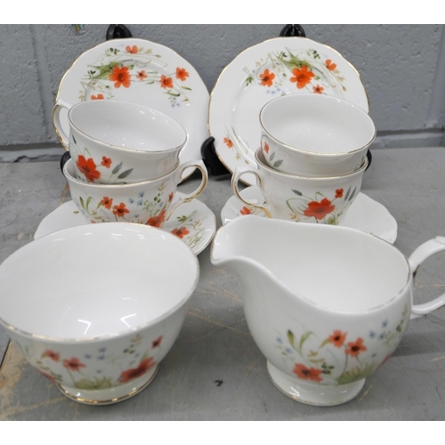 1047 - A Colclough tea set, cups, sauces, sugar bowl, milk jug, 11 plates and two large plates, together wi... 