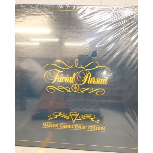 760 - A collection of games including Trivial Pursuit master game, genius edition (sealed), Shut the Box, ... 