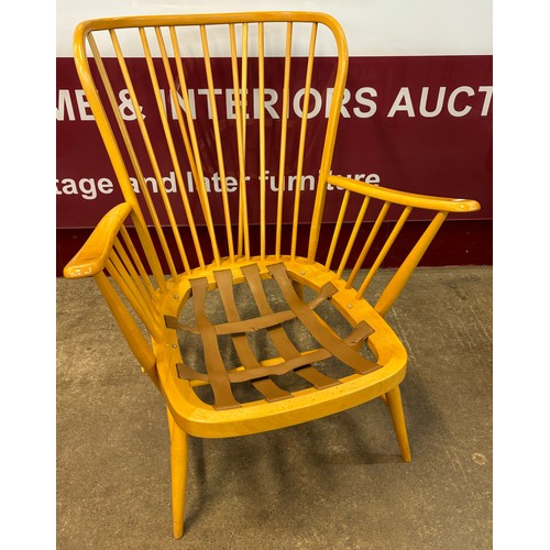 16 - An Ercol Blonde beech 478 model Windsor armchair