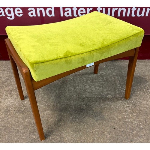 20 - A teak and lime green fabric footstool