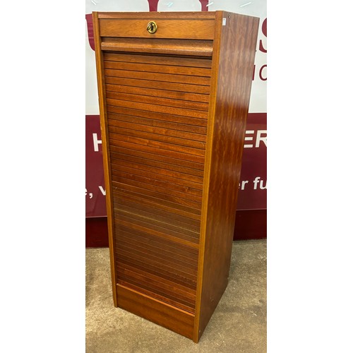 39 - A teak tambour front filing cabinet