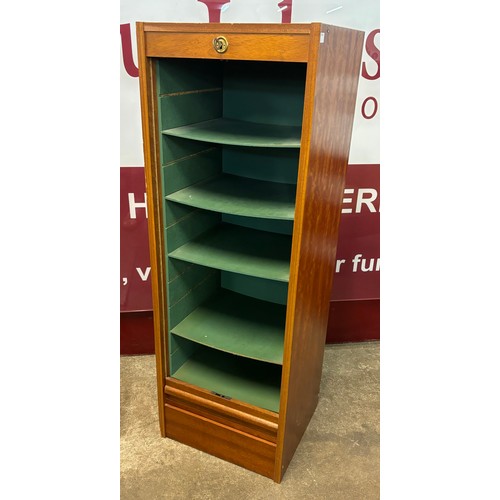 39 - A teak tambour front filing cabinet