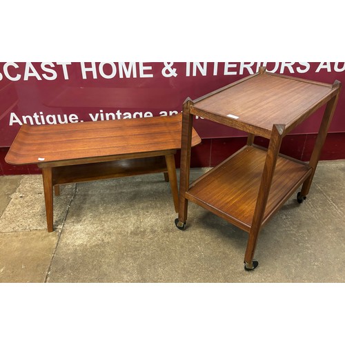 55 - A teak sleigh top coffee table and teak two tier cocktail trolley