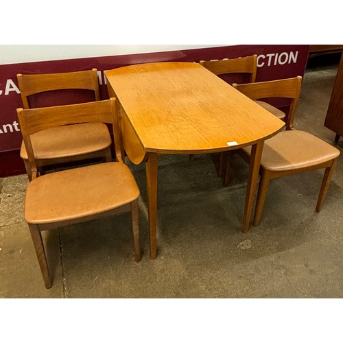 58 - A teak drop-leaf dining table and four chairs