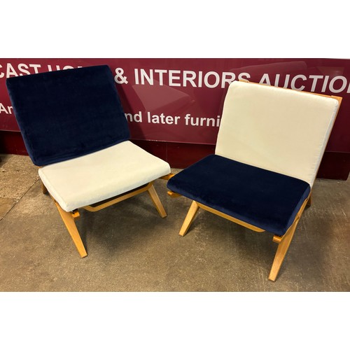 24 - A pair of Danish beech and fabric upholstered lounge chairs