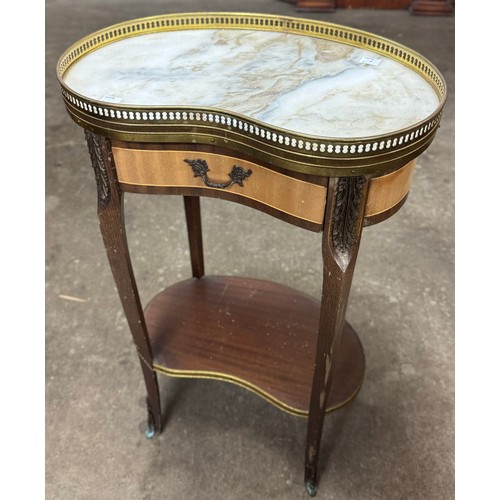 125 - A Louis XV style mahogany kidney shaped marble topped table de nuit