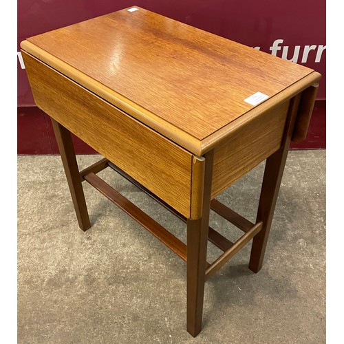 31 - A small teak drop-leaf occasional table