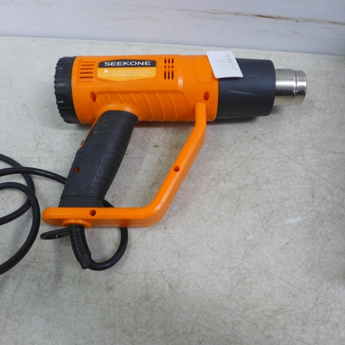 5009 - A Seekone HG886 heat gun, a glue gun and a digital multimeter