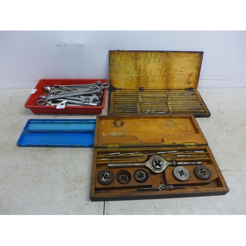 5016 - A cased tap and die set and a cased milling die set with a tray of assorted spanners  and saw blades... 