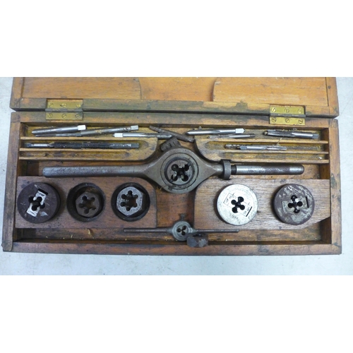 5016 - A cased tap and die set and a cased milling die set with a tray of assorted spanners  and saw blades... 