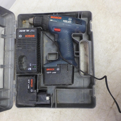 5034 - A Bosch GSR 12V cordless drill with 2 batteries and a 12v battery charger, an Einhell TE-RH 32E SDS ... 