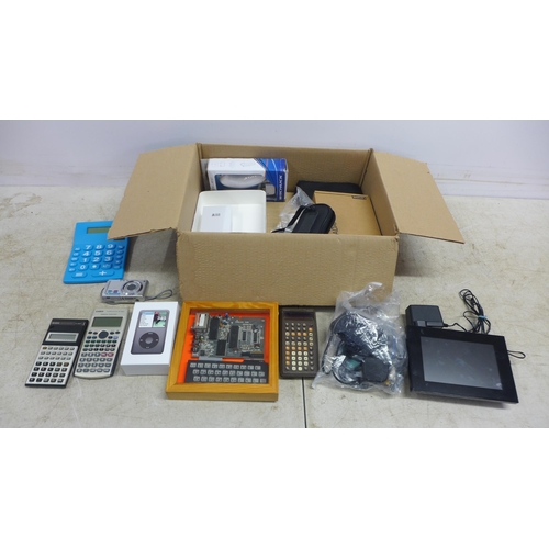 5049 - A black 120gb iPod Classic, a Panasonic camera, a Sony digital photo frame, calculators, a framed Si... 