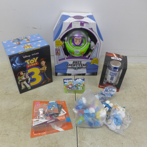 5054 - A quantity of toys including a Buzz Lightyear talking action figure in box, a Toy Story 3 CD set inc... 