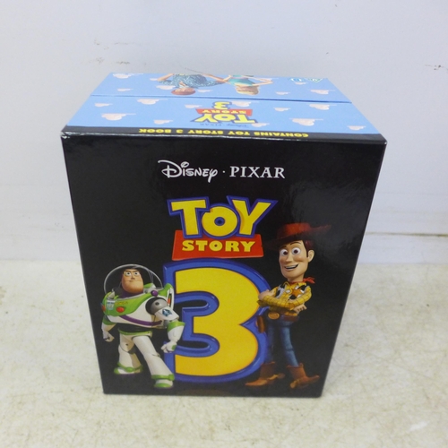 5054 - A quantity of toys including a Buzz Lightyear talking action figure in box, a Toy Story 3 CD set inc... 