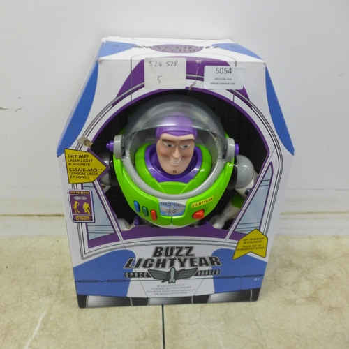 5054 - A quantity of toys including a Buzz Lightyear talking action figure in box, a Toy Story 3 CD set inc... 