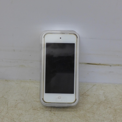 5067 - A 32gb iPod Touch with various Apple accessories including charger cables, charger blocks and phone ... 