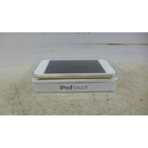 5067 - A 32gb iPod Touch with various Apple accessories including charger cables, charger blocks and phone ... 