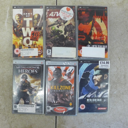 5071 - A Sony PSP handheld gaming console with charger and 14 games including Medal of Honor, Killzone, Gra... 