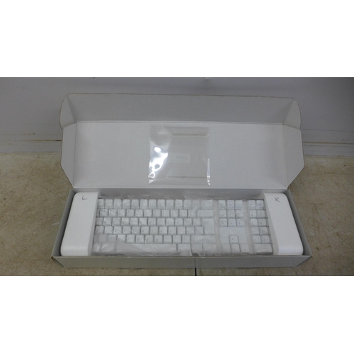 5073 - A MacBook 13 inch, LED backlit wide screen notebook with wireless Apple keyboard and a wireless Migh... 