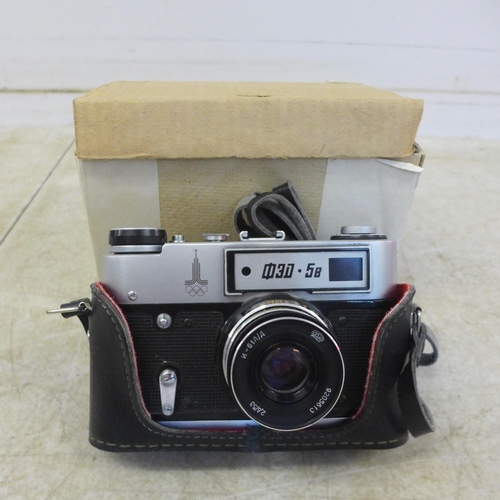 5076 - 2 boxed vintage 35mm cameras both Russian-made FED 5C and FED 58 and a Lubitel 166B box camera with ... 