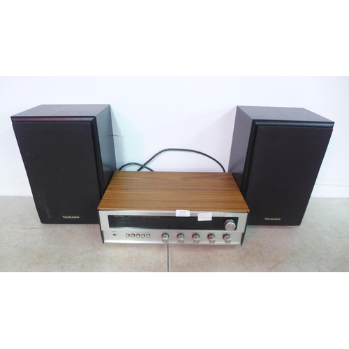 5100 - A Rotel RX-200A solid state stereo receiver and a pair of Technics SB-C250 speakers