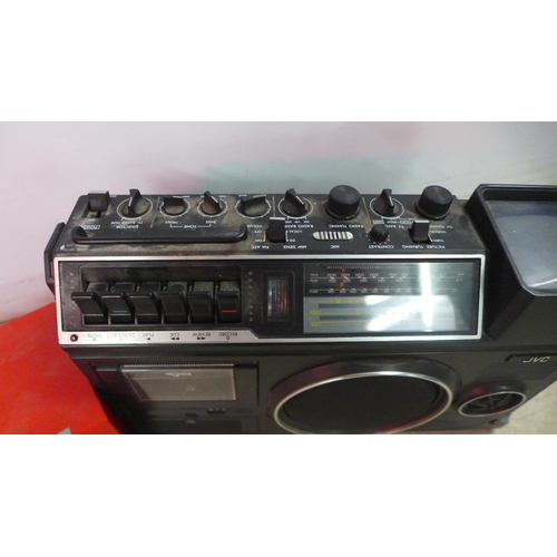 5110 - Two JVC portable music systems - a PC-50 4 band portable component system and a 3080UK radio-TV-cass... 