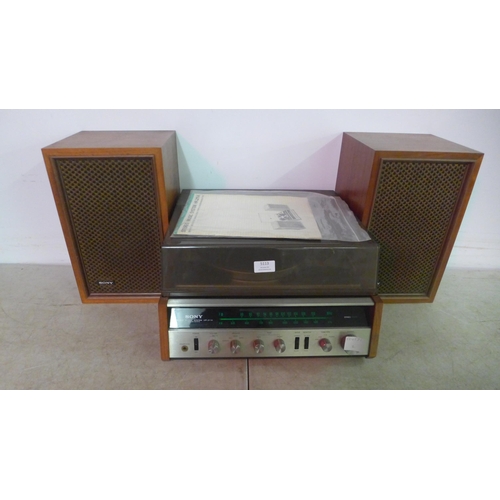 5113 - A Sony HP-211A solid state stereo music system with a pair of bookcase speakers