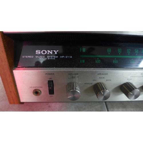 5113 - A Sony HP-211A solid state stereo music system with a pair of bookcase speakers