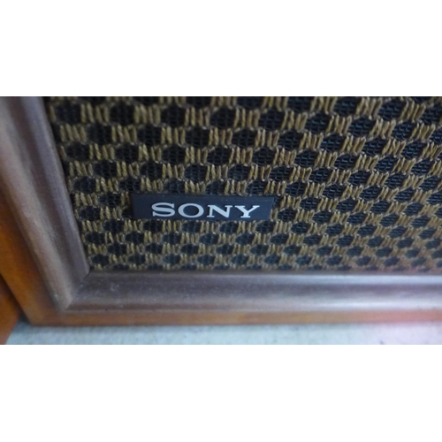 5113 - A Sony HP-211A solid state stereo music system with a pair of bookcase speakers