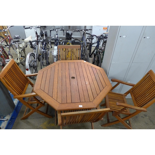 5154 - A Trifon teak Octagonal garden table and 4 folding chairs