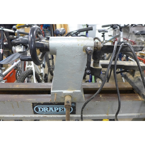 5156 - A Draper variable speed wood lathe and a large quantity of wood turning tools including R.sorby