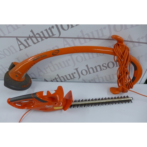 5162 - A Flymo Easicut460 hedge trimmer and a Flymo Revolution 2300 multi-trim strimmer