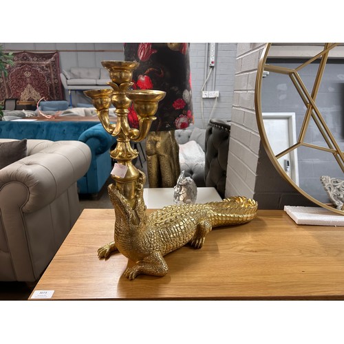 3074 - A gold crocodile candelabra