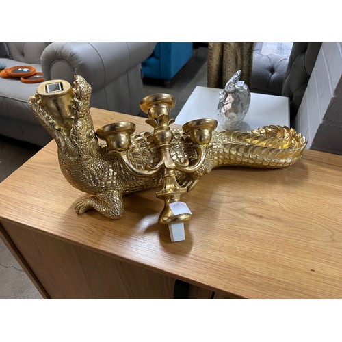 3074 - A gold crocodile candelabra