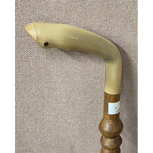 271 - An African carved hoof handled walking cane