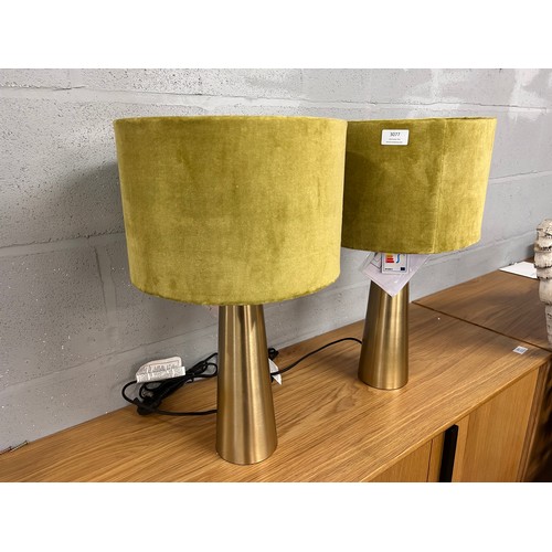 3077 - A pair of brass table lamps with green shades