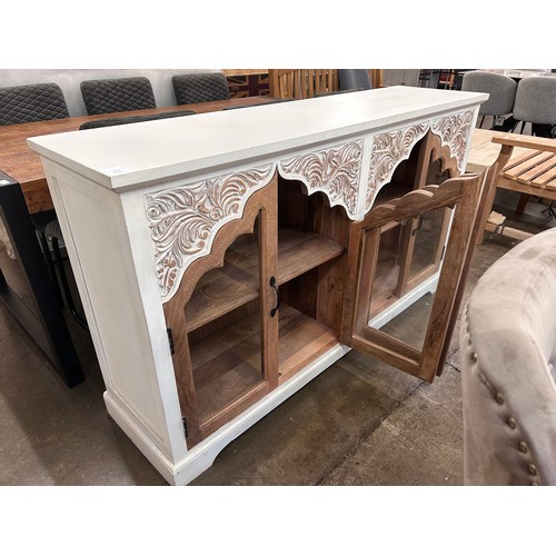 3113 - White sideboard with glass doors *This lot is subject to Vat