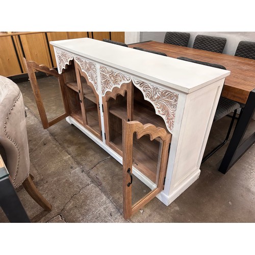 3113 - White sideboard with glass doors *This lot is subject to Vat