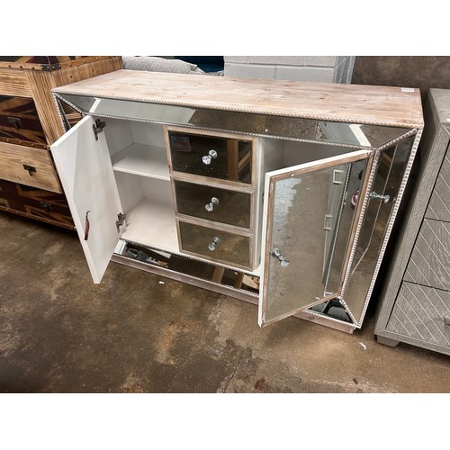 3128 - A large mirrored sideboard