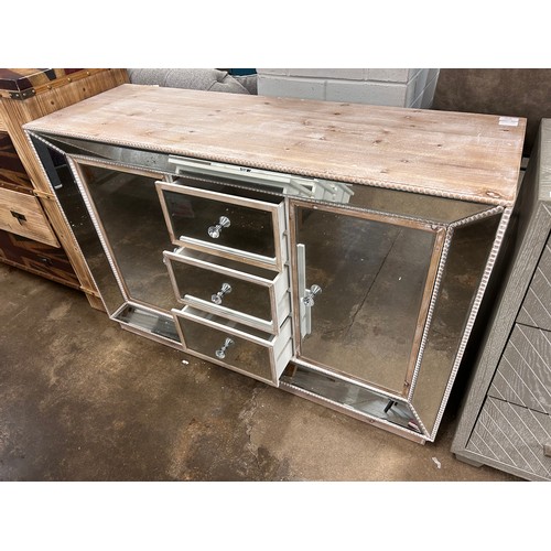 3128 - A large mirrored sideboard