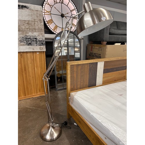 3152 - A brushed steel floor standing anglepoise lamp