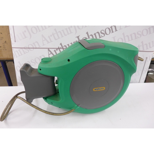 5170 - A large wall mountable Hozelock retractable hose reel