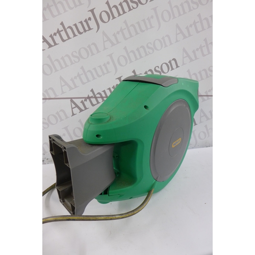 5170 - A large wall mountable Hozelock retractable hose reel